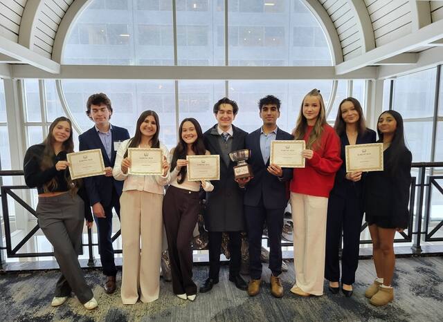 Delegates with their awards and trophies at ILMUNC