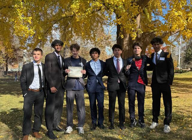 Delegates with an award at VAMUN